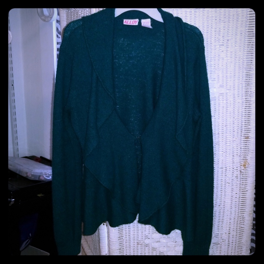 Knitted sweater with ruffles